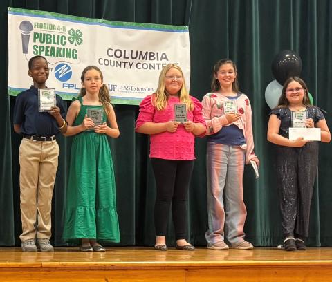 Fourth-grade winners in the Florida 4-H Public Speaking County Contest were Leo Lisius (from left), Violet Beamsley, Lexi Huffman, Charlie Stermer and Evalinah Miller. (COURTESY)