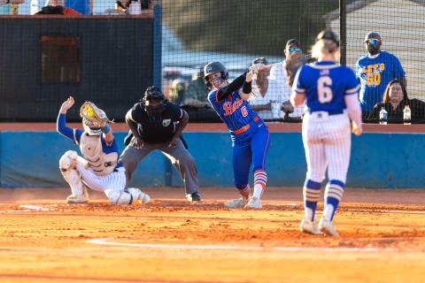 Branford third baseman Madyson Sikes swings through a pitch from Crystal River pitcher Violet Flynn on Tuesday. (JACK HOWDESHELL/Lake City Reporter)
