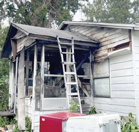 A fire burned the back porch of a residence on SE St. Margaret Drive on Thursday. The home owner was not injured by two dogs did die in the fire. (COURTESY LAKE CITY FIRE DEPARTMENT)