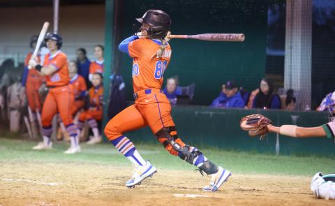 Branford catcher Morgan Brennan hits a single against Suwannee on Friday. (PAUL BUCHANAN/Lake City Reporter)