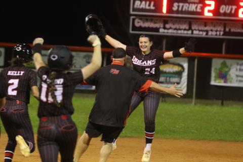 Fort White pitcher Kadence Compton (24) celebrates after her walk-off two-RBI double Tuesday against Santa Fe. (MORGAN MCMULLEN/Lake City Reporter)