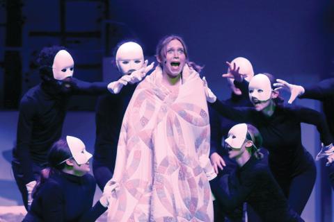 Betsy Peterson, portraying Sophie, reacts during a nightmare from Mamma Mia! The Suwannee High Theatre Troupe is performing the musical Thursday and Saturday at the SHS auditorium. (JAMIE WACHTER/Lake City Reporter)