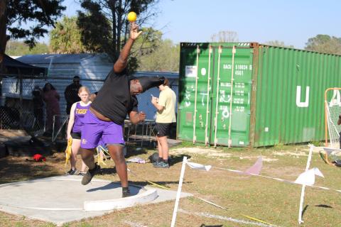 Columbia's De'Manuel Jones tosses during the shot put at the Santa Fe Freshman/Sophomore Invite on Wednesday. (COURTESY)