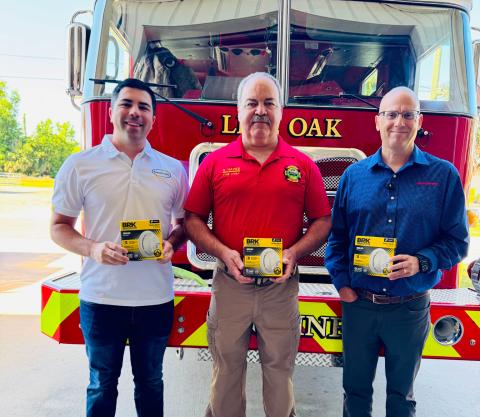 Live Oak Fire Chief Sidney Hayes (center) is pictured with Security Safe’s Joseph Peurrung (left) and Rob Cathcart with State Farm after the two companies donated 50 smoke detectors to the Live Oak Fire Department last week. (COURTESY)