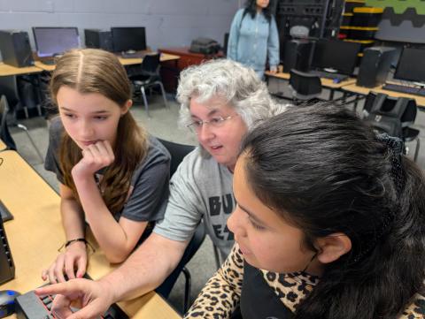 Suwannee Middle School teacher Tammy Neil (middle) gives directions to Lucy Kate Roberts (left) and Adelmary Jeronimo during broadcasting class Wednesday. Neil was honored as a top 30 influencer to watch by EdTech: Focus on K-12. (COURTESY)