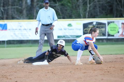 Columbia left fielder Sakiya Merriex slides safely into second base against Bolles on Feb. 27. (BRENT KUYKENDALL/Lake City Reporter)