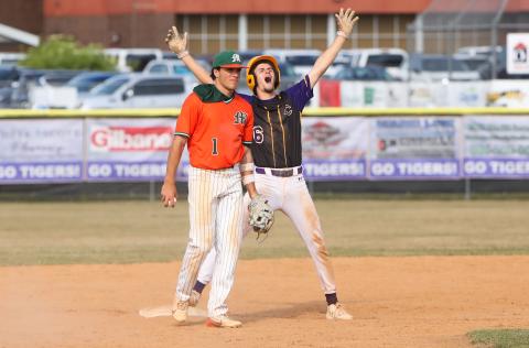 Columbia pitcher Bynton Edge celebrates at second base after driving in a run against Mosley during Game 2 of the Region 1-5A quarterfinals. (BRENT KUYKENDALL/Lake City Reporter)