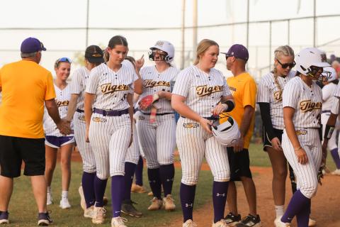 Columbia's Josie Raulerson celebrates with teammates after hitting a two-run home run against Riverside in the District 3-4A semifinals on Tuesday. (BRENT KUYKENDALL/Lake City Reporter)
