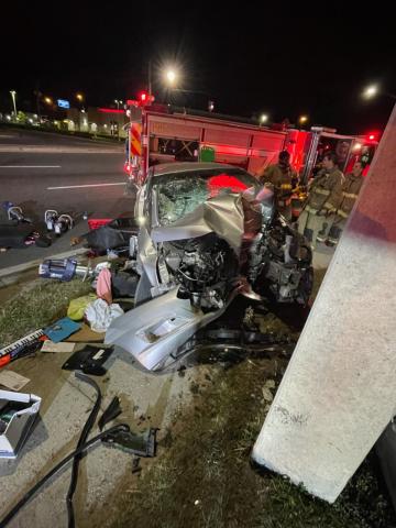 A woman was seriously injured early Saturday morning when her car slammed into a utility pole near the intersection of U.S. Highway 90 and SW Commerce Drive. (COURTESY LAKE CITY FIRE DEPARTMENT)