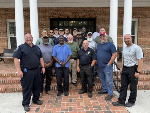 Retired law enforcement officers from around Suwannee County took firearm proficiency training last week at the Live Oak Police Department. Pictured with the retirees, who all passed, are Live Oak Police Capt. Jason Rountree (left), Chief Keith Davis (front middle) and Lt. Doug Hohman (right). (COURTESY)
