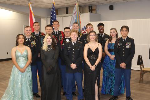 Columbia High School JROTC cadets, who are seniors, pose for a photograph after being recognized by other members of the Fighting Tiger Battalion during a military ball on Friday night at American Legion Post 57. (TONY BRITT/Lake City Reporter)