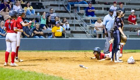 Santa Fe left fielder Madison Crosby slides safely into home plate to score a run against Columbia on Tuesday. (JACK HOWDESHELL/Lake City Reporter)