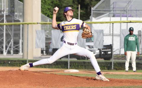 Columbia pitcher Bynton Edge winds up to pitch against Flagler Palm Coast on April 4. (BRENT KUYKENDALL/Lake City Reporter)
