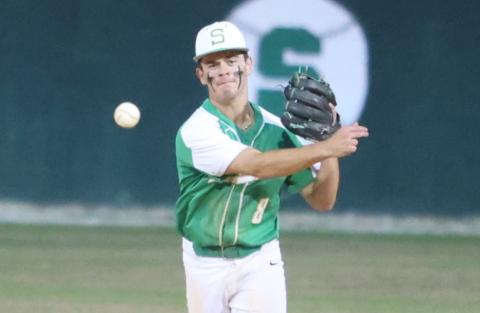 Suwannee second baseman Noah Lopez throws to first base for an out against Baldwin during Game 1 of the Region 1-3A quarterfinals on April 21. (PAUL BUCHANAN/Lake City Reporter)