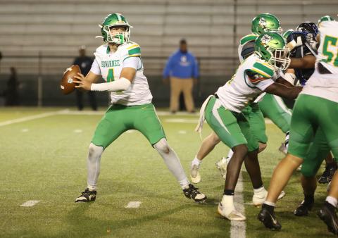 Suwannee quarterback Thomas Sikes drops back to pass against Godby in Region 1-3A quarterfinals on Nov. 15, 2024. (PAUL BUCHANAN/Lake City Reporter)