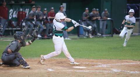 Suwannee catcher Grayson Bonds makes contact against Chiles on March 11. (PAUL BUCHANAN/Lake City Reporter)