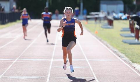 Branford runner Alex Whitfield races to the finish line to win the 100m title at the District 5-1A meet on Saturday. (PAUL BUCHANAN/Lake City Reporter)