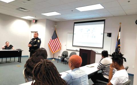 Lake City Police Chief Gerald Butler talks with teens about interviewing during the police department’s Sumer Youth Employment Program in 2019. (COURTESY)