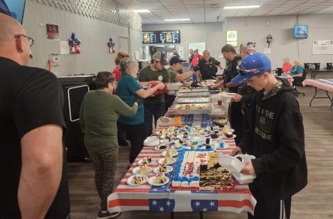 First responders and guests line up for grub at the American Legion Post 57’s First Responders Appreciation Luncheon. (COURTESY)