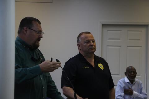 Lake City Police Chief Gerald Butler (right) said any rumors that Officer Marcus Hardison being shot by another law enforcement officer were not true. (MORGAN MCMULLEN/Lake City Reporter)