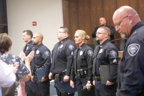 Live Oak police officers Andrew Cook (from left), Evelio Alvarez, Sgt. Gerald Butler III, Brandie Harden and Sgt. Mark Pierce were honored for their actions in pursuing and neutralizing murder suspect Dominic Caraway in February. (JAMIE WACHTER/Lake City Reporter)