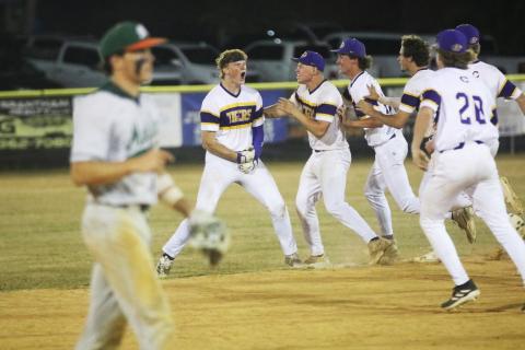 Columbia pitcher Nolan Slaymaker celebrates with teammates after hitting a walk-off double against Mosley in Game 1 of the Region 1-5A quarterfinals on Wednesday. (JORDAN KROEGER/Lake City Reporter)