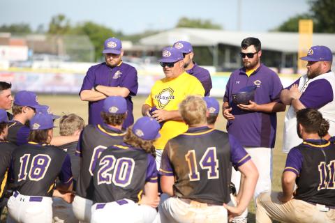 Columbia coach Chris Howard speaks to his team following the Tigers' sweep over Mosley in the Region 1-5A quarterfinals on April 24. (BRENT KUYKENDALL/Lake City Reporter)