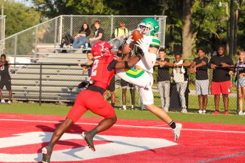 Suwannee receiver Koy Frier can't hold on to a catch that's wrestled away by Bradford defensive back Jordan Cason for an interception during the teams' spring game Thursday night. (BRENT KUYKENDALL/Lake City Reporter)