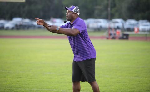 Columbia coach Brian Allen calls out to his team during the Tigers’ spring game against Fort White on May 17. (BRENT KUYKENDALL/Lake City Reporter)