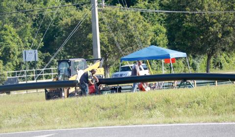 Florida Fill Grading workers work on fusing pipes together on the north side of the State Road 47 and Interstate 75 interchange Friday morning. (JAMIE WACHTER/Lake City Reporter)