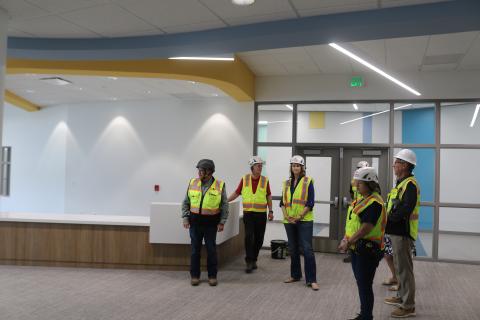 Assistant Superintendent Todd Widergren (right) and Fred Gaylard, the district’s new construction project manager (left), give Half-Cent Sales Tax Advisory Committee members a tour of the new Niblack Elementary School on Wednesday. (TONY BRITT/Lake City Reporter)