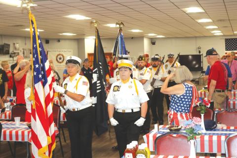 The American Legion Post 57 honor guard presents the colors during the organization’s Memorial Day ceremony on Monday. (TONY BRITT/Lake City Reporter)