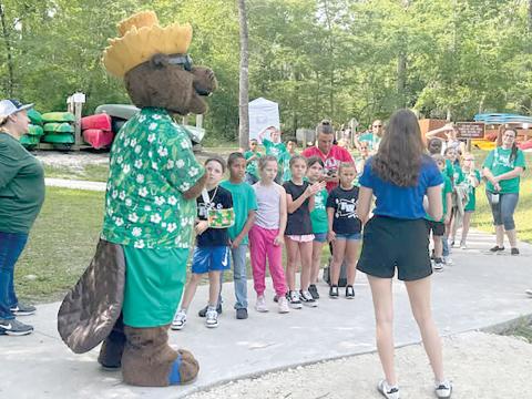 Bellamy the Beaver hosted a water celebration at Ichetucknee Springs State Park recently where students conservation and hands-on science. (COURTESY)