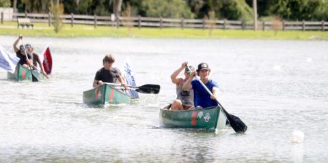 Brock and William Dees, the winners of the inaugural DeSoto Derby Canoe Race last year, lead down the home stretch. (FILE)