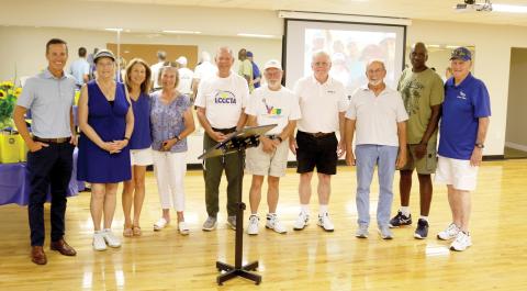 Lake City Columbia Community Tennis Association members and guests who have a tremendously positive influence on the program and its development, pose for a picture on Thursday afternoon in Teen Town during the organization’s 10th Anniversary celebration event. (TONY BRITT/Lake City Reporter)