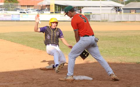 Columbia outfielder Tison McCray slides into third base against Mosley during Game 2 of the Region 1-5A quarterfinals on April 24. (BRENT KUYKENDALL/Lake City Reporter)