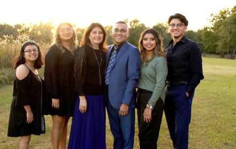 Maria Isidro (third from right), pictured with her husband Josafat and their four children, was detained last week by immigration officials during a meeting in Tallahassee. Her family said she was dropped off at the Mexican border Wednesday night. (COURTESY)