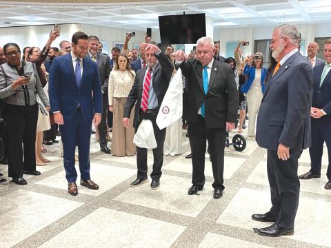 House Speaker Daniel Perez (left) and Senate President Ben Albritton (right) took part in a traditional hanky-drop ceremony marking the end of the legislative  session. (NEWS SERVICE OF FLORIDA)