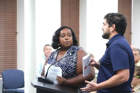 Shannon Williams (left) and Michael Klink update the Lake City Council on a Hazard Mitigation Grant meant for restoration at Gwen Lake during Monday’s meeting. (MORGAN MCMULLEN/Lake City Reporter)
