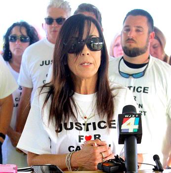 Maria David, Carmen Gayheart’s sister, talks with the press after the execution of Anthony Wainwright, who kidnapped and killed Gayheart in 1994. (JOHN S. KOCH/Special to the Reporter)