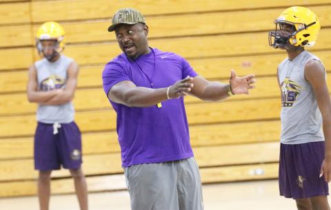 Columbia coach Brian Allen coaches during Monday’s practice, which was forced into the gym due to extreme heat. (JORDAN KROEGER/Lake City Reporter)