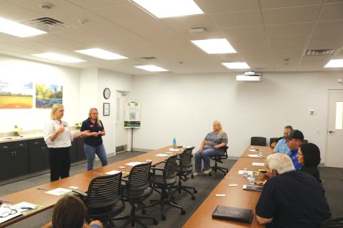 Land planners Kristin Reed (left) and Blair Knighting get feedback and information from local business and development representatives during a meeting on Friday as the county looks to upgrade its land development regulations. (TONY BRITT/Lake City Reporter)