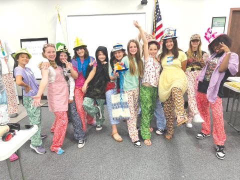 UF/IFAS 4-H Fashion Design campers show off their creations following a pair of days learning different sewing techniques. (COURTESY UF/IFAS EXTENSION)