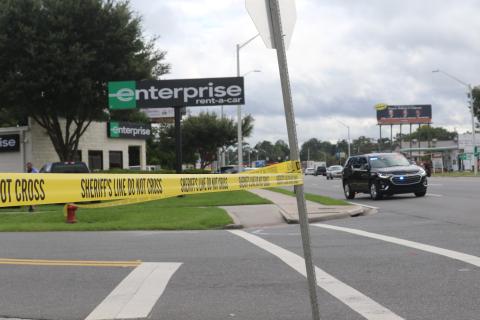 Law enforcement officials converged at the Enterprise Rent-A-Car facility on U.S. Highway 90 after an employee noticed a strange device in a car during vehicle inspections. The device was deemed not dangerous by the Alachua County Sheriff’s Office Bomb Squad. (JAMIE WACHTER/Lake City Reporter)
