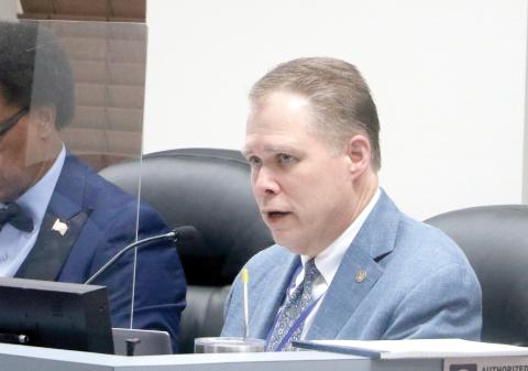 Lake City Attorney Clay Martin gave a brief summary of the city’s involvement with the history of the Club House on Lake Isabella on Thursday. (MORGAN MCMULLEN/Lake City Reporter)