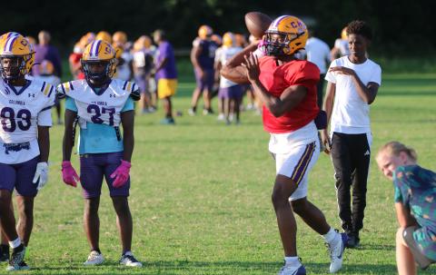 Columbia quarterback Xavier Collins throws a pass during practice on Tuesday. (JORDAN KROEGER/Lake City Reporter)