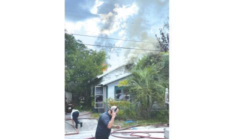 Firefighters from the Lake City Fire Department and Columbia County Fire Rescue responded to a house fire on NE Richardson Terrace Tuesday afternoon. (COURTESY)
