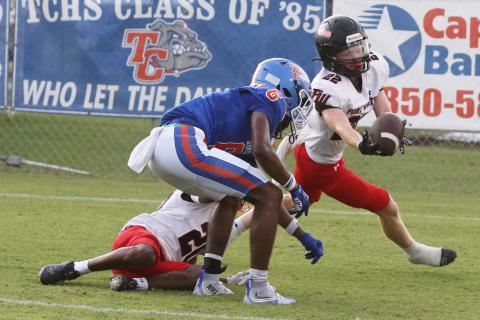 Fort White linebacker Wyatt Holton (22) intercepts a Taylor County pass last Friday. (MORGAN MCMULLEN/Lake City Reporter)
