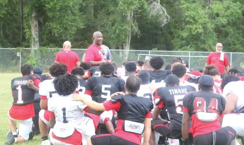 Fort White coach Demetric Jackson addresses his team after practice on Aug. 4. (MORGAN MCMULLEN/Lake City Reporter)