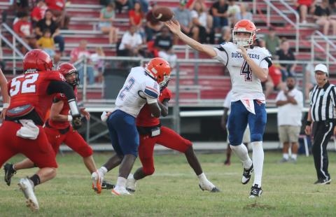 Branford quarterback Trent Land releases a pass against Dixie County in the Preseason Classic on Aug. 15. (PAUL BUCHANAN/Lake City Reporter)